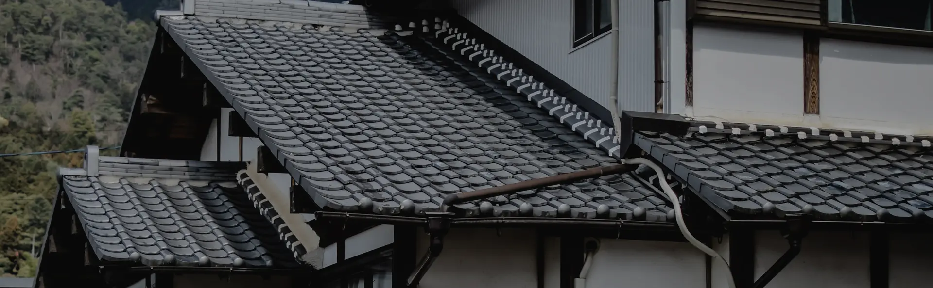 Maison avec toiture multiple